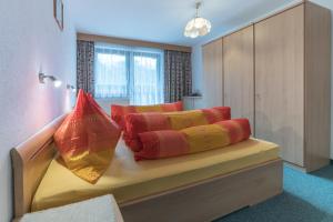 מיטה או מיטות בחדר ב-Appartement Nicola