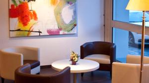 Posezení v ubytování BRIT HOTEL Confort Le Limouzi TULLE