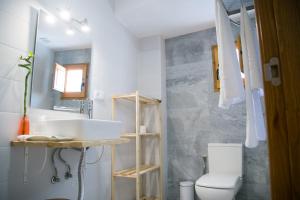 Un baño de Apartamentos Turísticos La Casa Vieja