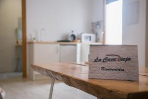 Una cocina o zona de cocina en Apartamentos Turísticos La Casa Vieja