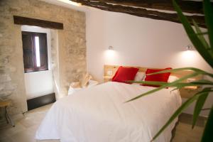 Cama o camas de una habitación en Apartamentos Turísticos La Casa Vieja