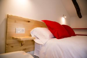 Cama o camas de una habitación en Apartamentos Turísticos La Casa Vieja