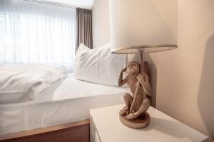 Postelja oz. postelje v sobi nastanitve Hotel Birsighof Basel City Center