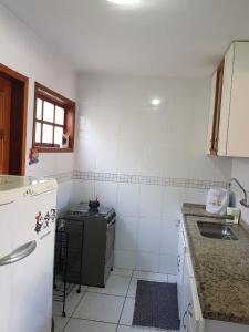 Kuchyň nebo kuchyňský kout v ubytování Pousada Caminho do Mar