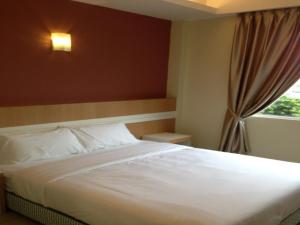 Postel nebo postele na pokoji v ubytování Caspari Hotel + 9 fotografií