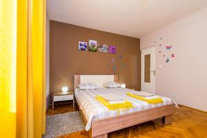 Posteľ alebo postele v izbe v ubytovaní Villa Doli - Lovely holiday home with private pool + 37 fotografií