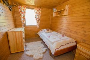 Ένα ή περισσότερα κρεβάτια σε δωμάτιο στο Chalet Veľké Ostré