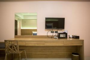 Kuchyň nebo kuchyňský kout v ubytování Unity Hotel