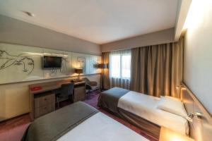 Posteľ alebo postele v izbe v ubytovaní Hotel HP Park