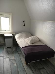 Un pat sau paturi într-o cameră la Nebulosavägen 20
