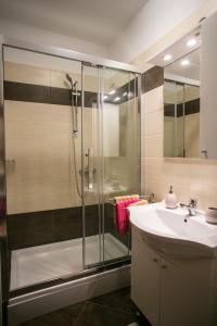 a bathroom with a shower and a sink at Agata Apartments in Novalja +74 photos