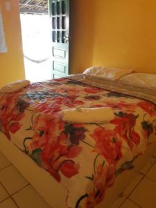 מיטה או מיטות בחדר ב-Pousada Cataventos