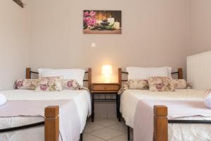 Posteľ alebo postele v izbe v ubytovaní Rose Residence-360º sea view