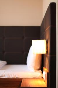 Postel nebo postele na pokoji v ubytování Hotel Kunstmühle
