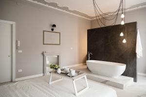 Koupelna v ubytování Le Bain Suite - accanto al Mare vicinissima a Ortigia e al Teatro