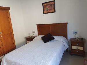 Postel nebo postele na pokoji v ubytování Casita la Herilla