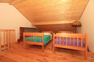 Postel nebo postele na pokoji v ubytování Apartments Slađana