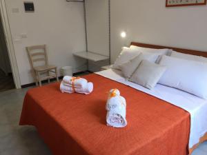 A bed or beds in a room at YooRoom