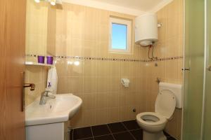 Koupelna v ubytování Apartments Slađana
