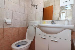 Koupelna v ubytování Apartments Slađana