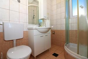 Kúpeľňa v ubytovaní Apartments Slađana + 37 fotografií