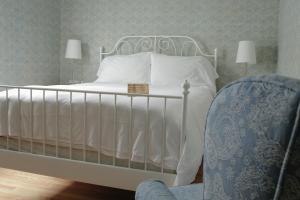Voodi või voodid majutusasutuse Albergo Allegria Hotel & Breakfast Restaurant toas