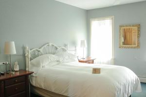 Voodi või voodid majutusasutuse Albergo Allegria Hotel & Breakfast Restaurant toas
