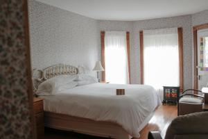 Voodi või voodid majutusasutuse Albergo Allegria Hotel & Breakfast Restaurant toas