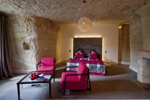 Coin salon dans l'établissement Hotel Les Hautes Roches