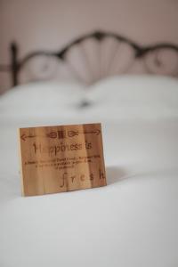 Voodi või voodid majutusasutuse Albergo Allegria Hotel & Breakfast Restaurant toas