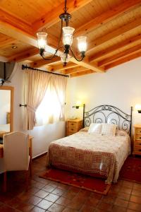 Cama o camas de una habitación en Hotel El Curro