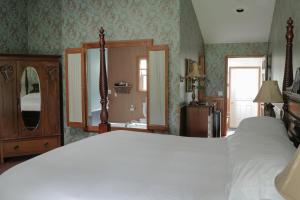 Voodi või voodid majutusasutuse Albergo Allegria Hotel & Breakfast Restaurant toas