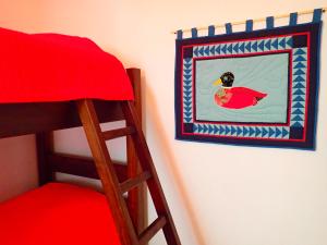 Postel nebo postele na pokoji v ubytování Orosi Lodge