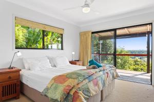 Ένα ή περισσότερα κρεβάτια σε δωμάτιο στο Byron Hinterland Villas