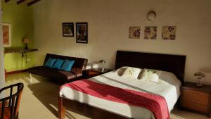 Postel nebo postele na pokoji v ubytování Hotel Faroazul RNT12633
