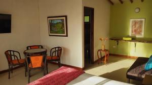 TV a/nebo společenská místnost v ubytování Hotel Faroazul RNT12633
