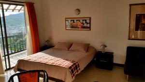 Postel nebo postele na pokoji v ubytování Hotel Faroazul RNT12633