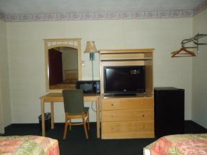 TV a/nebo společenská místnost v ubytování Relax Inn + 16 fotografií