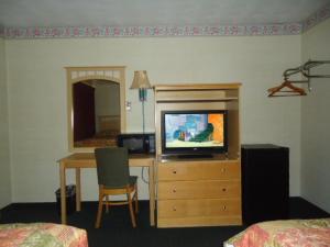 TV a/nebo společenská místnost v ubytování Relax Inn