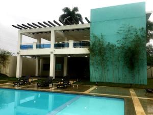 Bazén v ubytování Aprtamento Deluxe Santiago, Residencial Palma Real R402 nebo v jeho okolí