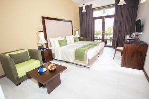 Amora Lagoon Hotel客房内的一张或多张床位