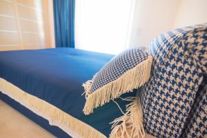 A bed or beds in a room at All Saints Villas