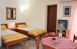 Postel nebo postele na pokoji v ubytování Batkoski Apartments