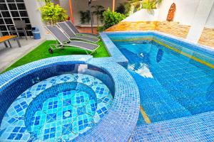 Bazén v ubytování Grande Adam Private Pool Villa nebo v jeho okolí