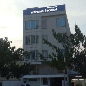a building with a sign on top of it at Ethan Hotel Kelapa Gading in Jakarta
