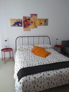 Postel nebo postele na pokoji v ubytování Enjoy Trani