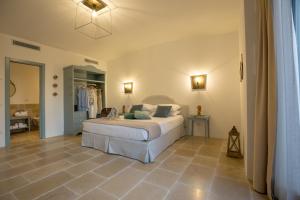 A bed or beds in a room at Romantic Relais Sorrento
