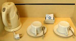 Set per la preparazione di tè e caffè presso Hotel Brothers Solo