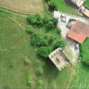 an aerial view of an old house in a field at Casa Rural Pocotrigo in Linares