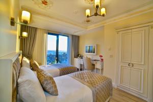 TV/Unterhaltungsangebot in der Unterkunft Yılsam Sultanahmet Hotel